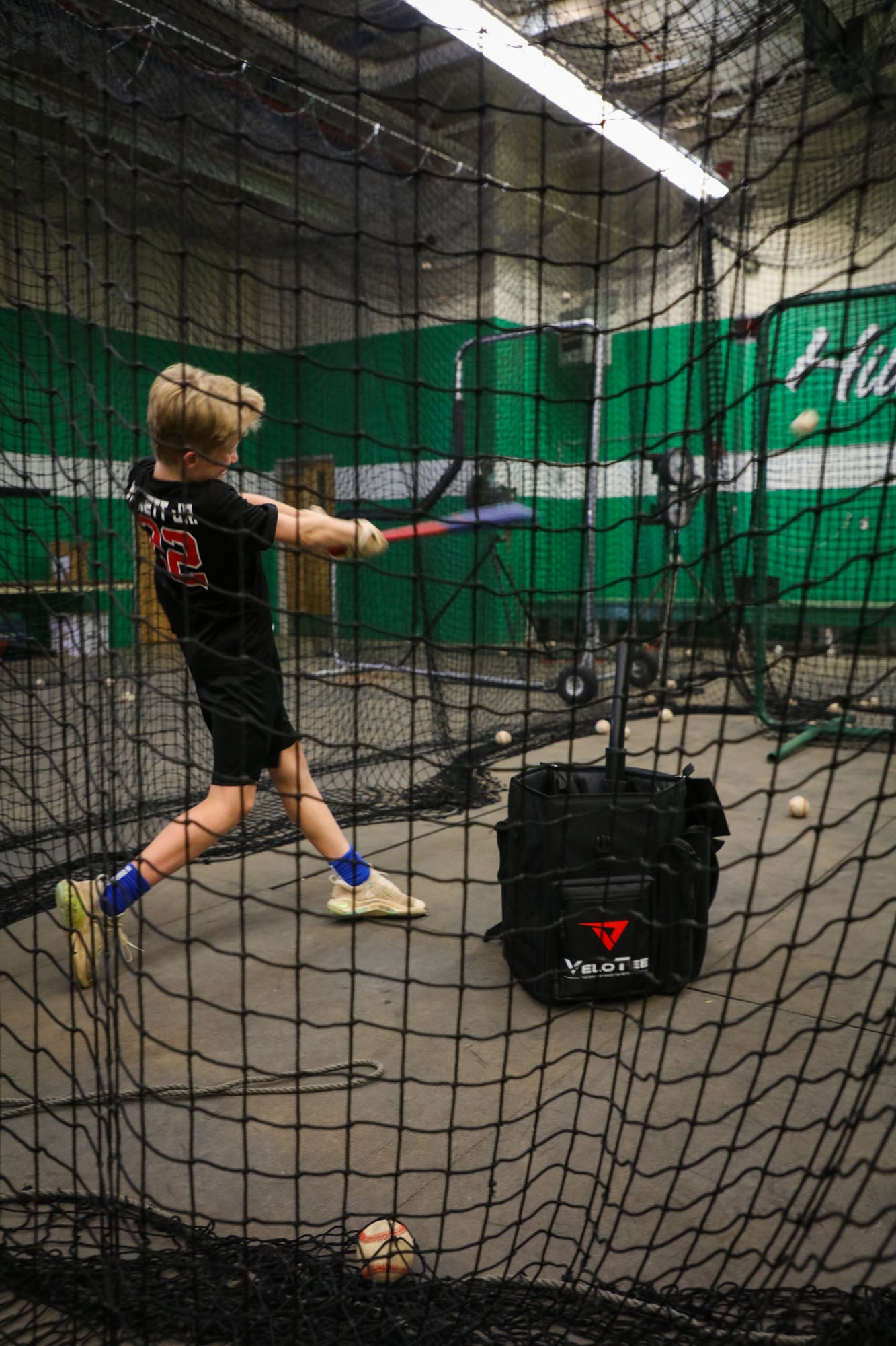 VeloTee allows baseball players and softball players to hit batting practice from their own equipment bag. 
